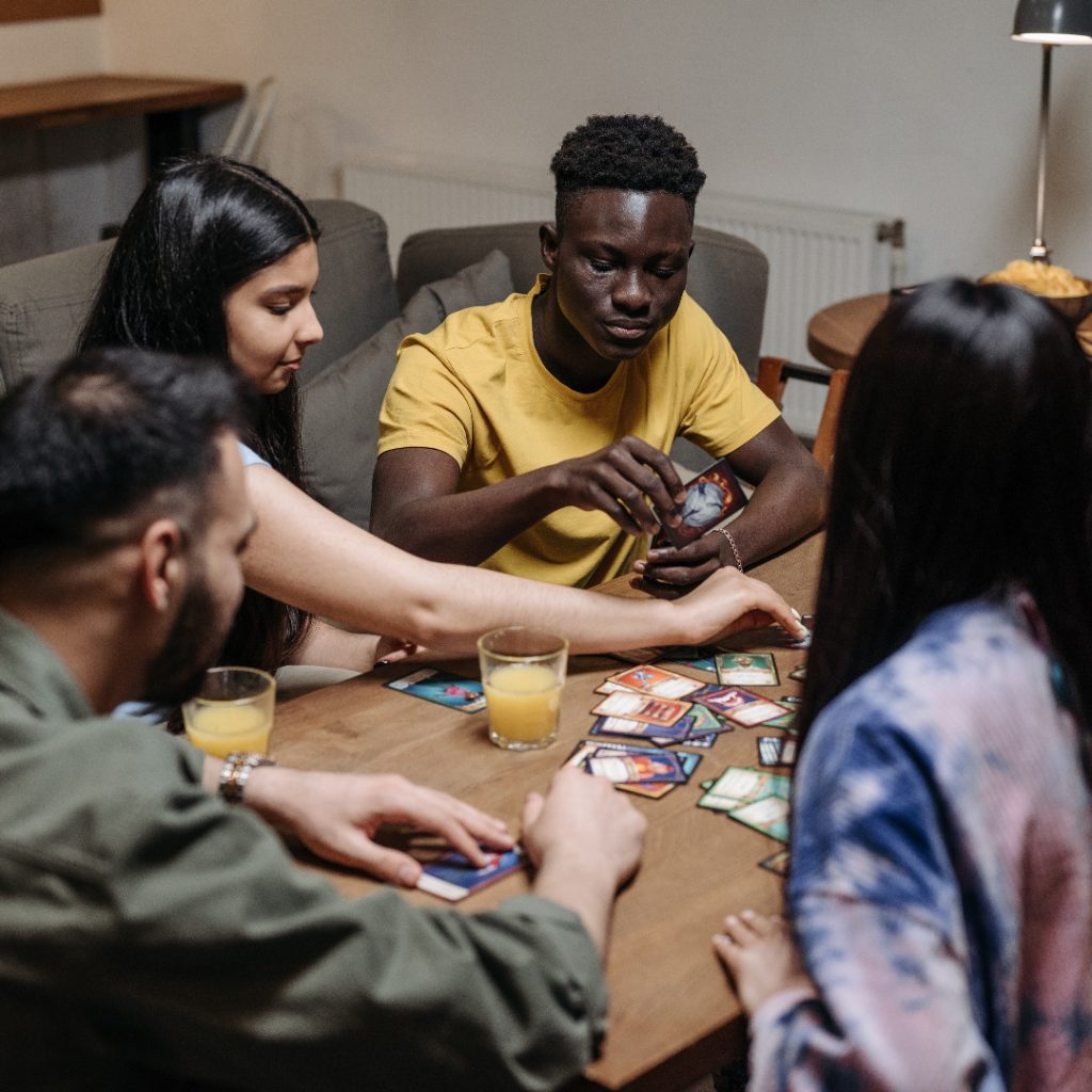 People playing board games